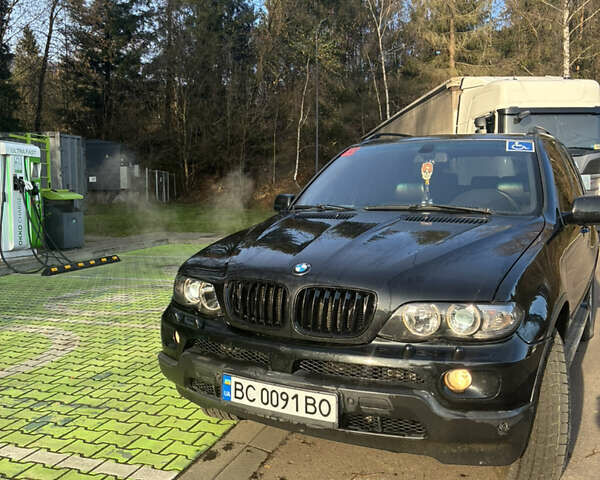 Черный БМВ Х5, объемом двигателя 4.4 л и пробегом 333 тыс. км за 9999 $, фото 1 на Automoto.ua