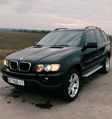 Чорний БМВ Х5, об'ємом двигуна 2.93 л та пробігом 460 тис. км за 9950 $, фото 1 на Automoto.ua