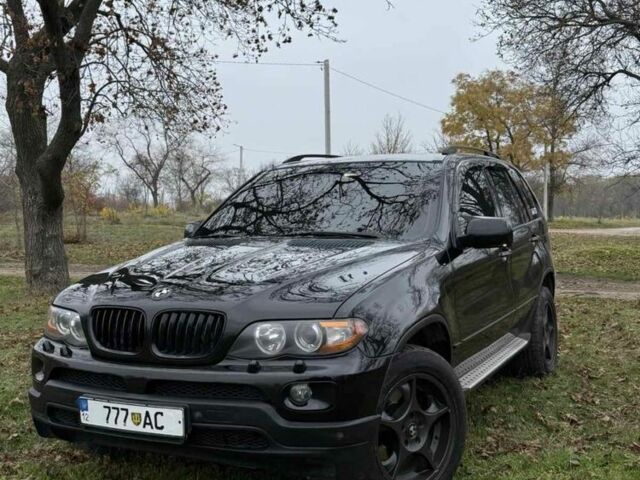 Черный БМВ Х5, объемом двигателя 3 л и пробегом 404 тыс. км за 9500 $, фото 1 на Automoto.ua