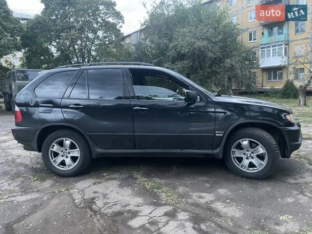 Черный БМВ Х5, объемом двигателя 3 л и пробегом 300 тыс. км за 4100 $, фото 1 на Automoto.ua