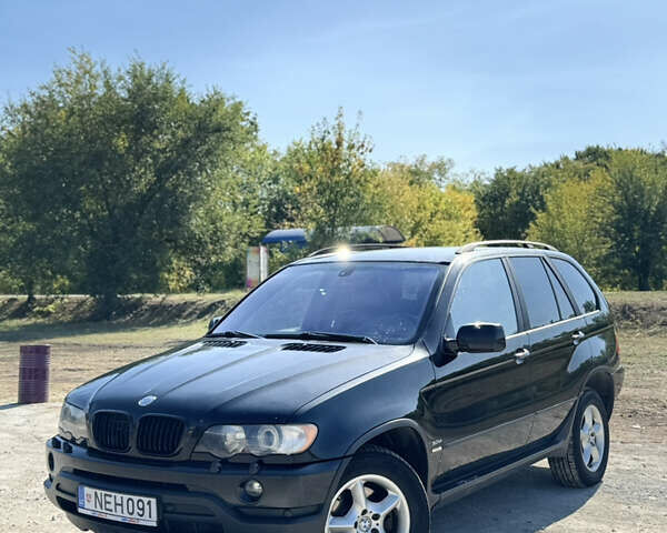 Чорний БМВ Х5, об'ємом двигуна 3 л та пробігом 333 тис. км за 6000 $, фото 1 на Automoto.ua
