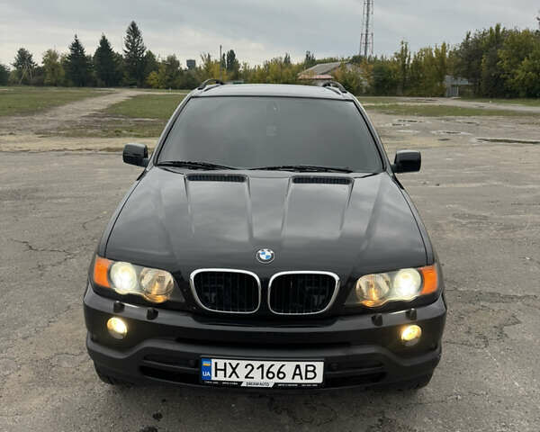 Чорний БМВ Х5, об'ємом двигуна 2.98 л та пробігом 320 тис. км за 9500 $, фото 1 на Automoto.ua