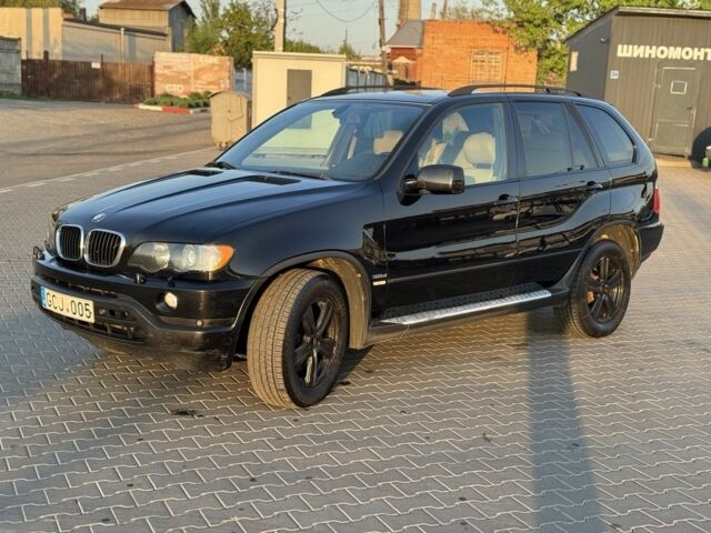 Чорний БМВ Х5, об'ємом двигуна 3 л та пробігом 365 тис. км за 4999 $, фото 1 на Automoto.ua