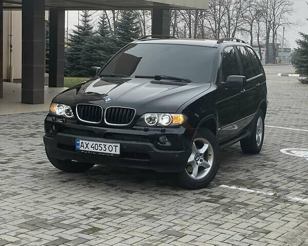 Черный БМВ Х5, объемом двигателя 3 л и пробегом 378 тыс. км за 12000 $, фото 1 на Automoto.ua