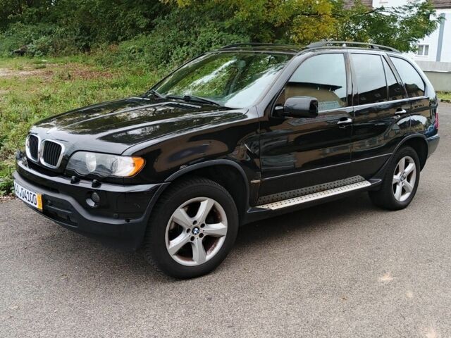 Черный БМВ Х5, объемом двигателя 3 л и пробегом 330 тыс. км за 6000 $, фото 1 на Automoto.ua