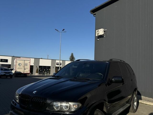 Черный БМВ Х5, объемом двигателя 3 л и пробегом 365 тыс. км за 10950 $, фото 1 на Automoto.ua