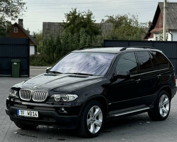 Черный БМВ Х5, объемом двигателя 3 л и пробегом 411 тыс. км за 14500 $, фото 1 на Automoto.ua