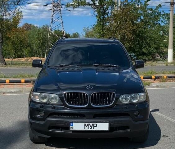 Черный БМВ Х5, объемом двигателя 3 л и пробегом 416 тыс. км за 12000 $, фото 1 на Automoto.ua