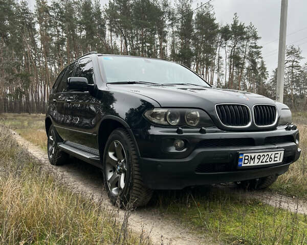 Черный БМВ Х5, объемом двигателя 3 л и пробегом 435 тыс. км за 12500 $, фото 1 на Automoto.ua