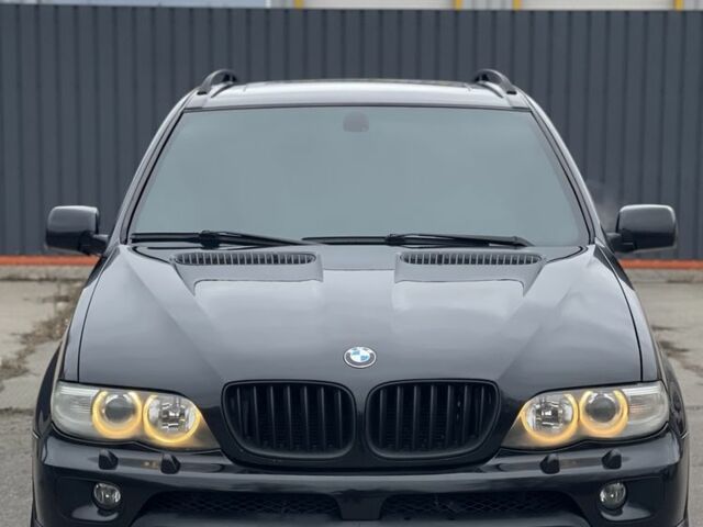 Черный БМВ Х5, объемом двигателя 4.4 л и пробегом 350 тыс. км за 8000 $, фото 1 на Automoto.ua