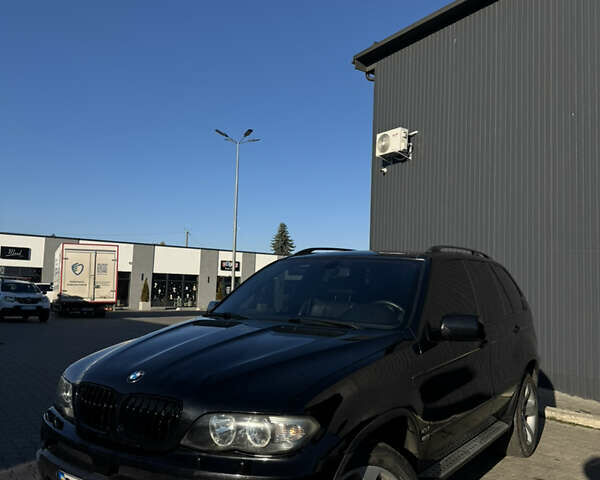 Черный БМВ Х5, объемом двигателя 3 л и пробегом 365 тыс. км за 10950 $, фото 1 на Automoto.ua