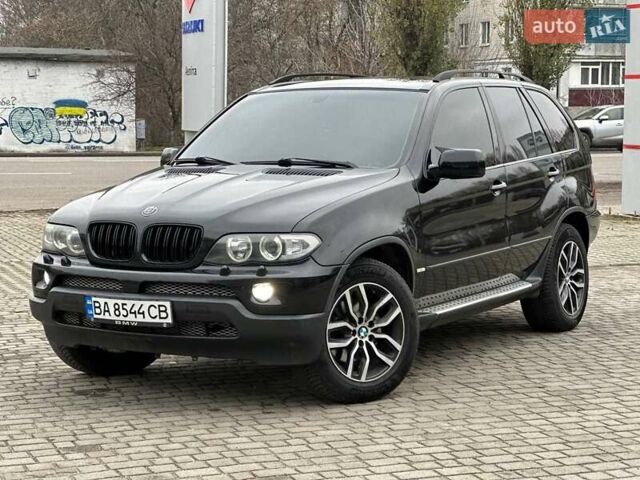 Черный БМВ Х5, объемом двигателя 3 л и пробегом 250 тыс. км за 12999 $, фото 1 на Automoto.ua