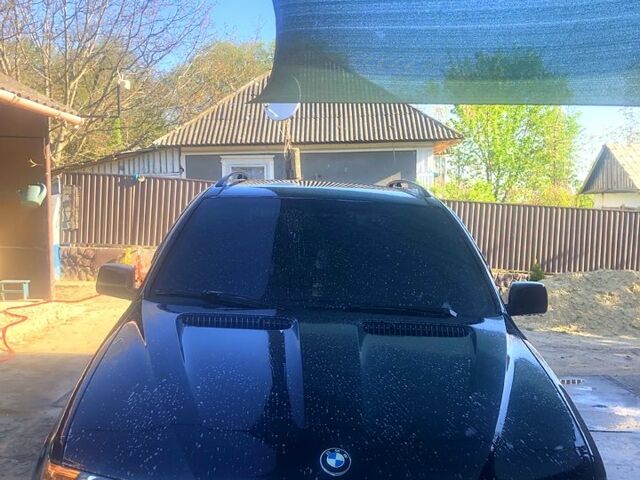 Черный БМВ Х5, объемом двигателя 3 л и пробегом 448 тыс. км за 10500 $, фото 1 на Automoto.ua