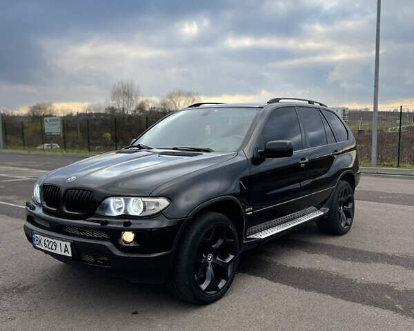 Чорний БМВ Х5, об'ємом двигуна 3 л та пробігом 307 тис. км за 11599 $, фото 1 на Automoto.ua