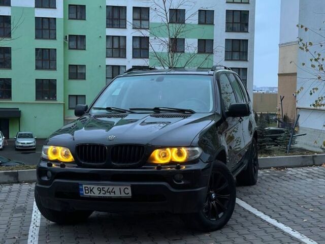 Черный БМВ Х5, объемом двигателя 3 л и пробегом 240 тыс. км за 11200 $, фото 1 на Automoto.ua