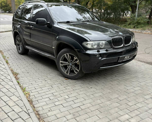 Черный БМВ Х5, объемом двигателя 3 л и пробегом 325 тыс. км за 6450 $, фото 1 на Automoto.ua
