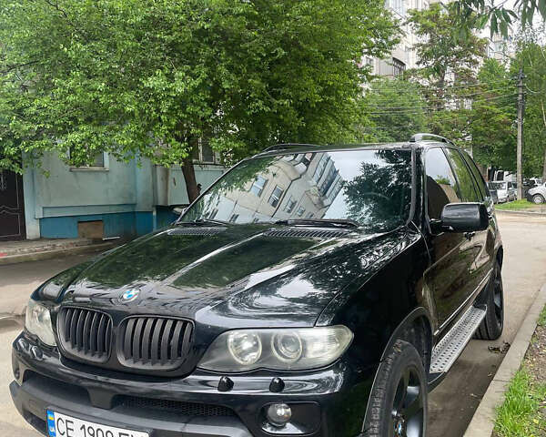 Черный БМВ Х5, объемом двигателя 3 л и пробегом 371 тыс. км за 10500 $, фото 1 на Automoto.ua