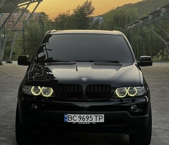 Чорний БМВ Х5, об'ємом двигуна 3 л та пробігом 315 тис. км за 11499 $, фото 1 на Automoto.ua