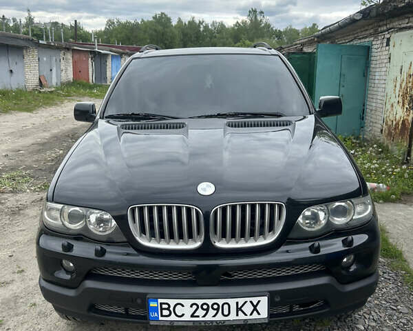 Черный БМВ Х5, объемом двигателя 3 л и пробегом 341 тыс. км за 14000 $, фото 1 на Automoto.ua