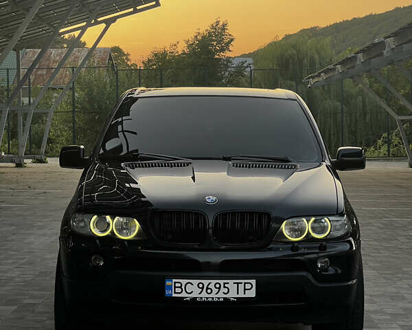 Чорний БМВ Х5, об'ємом двигуна 3 л та пробігом 317 тис. км за 11799 $, фото 1 на Automoto.ua