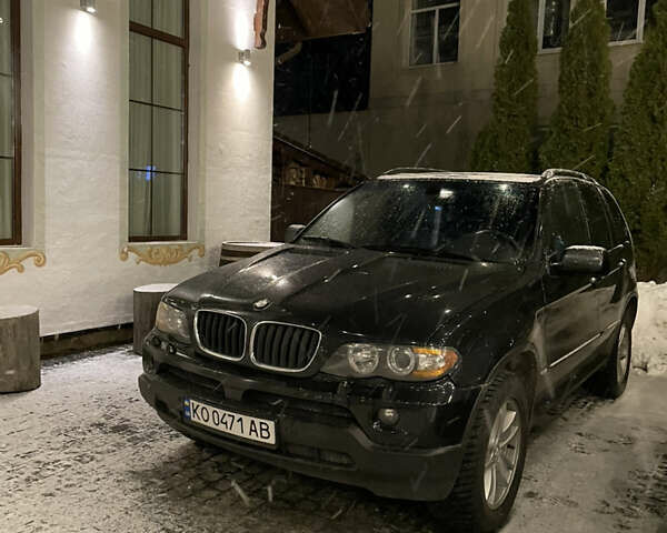 Черный БМВ Х5, объемом двигателя 4.4 л и пробегом 265 тыс. км за 9100 $, фото 1 на Automoto.ua