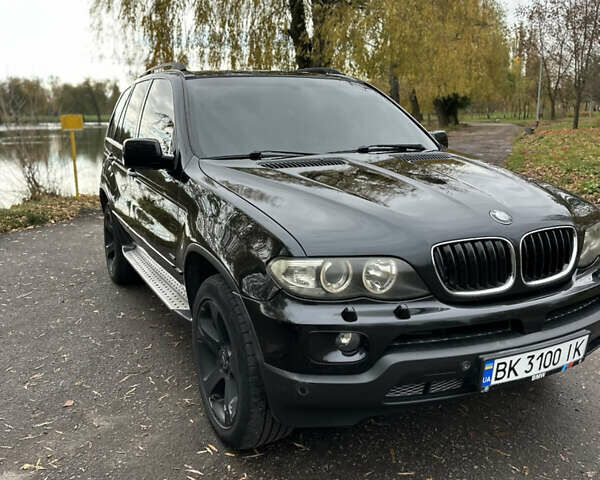 Черный БМВ Х5, объемом двигателя 3 л и пробегом 342 тыс. км за 11800 $, фото 1 на Automoto.ua