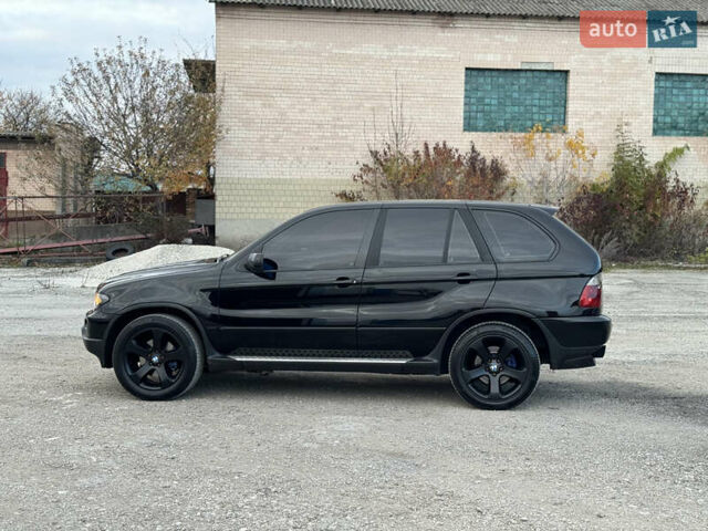 Черный БМВ Х5, объемом двигателя 3 л и пробегом 320 тыс. км за 11999 $, фото 1 на Automoto.ua