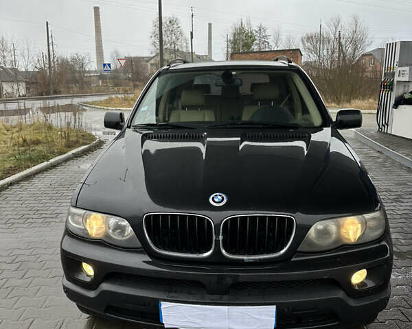 Чорний БМВ Х5, об'ємом двигуна 3 л та пробігом 320 тис. км за 5999 $, фото 1 на Automoto.ua