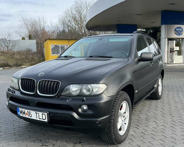 Чорний БМВ Х5, об'ємом двигуна 3 л та пробігом 300 тис. км за 4999 $, фото 1 на Automoto.ua