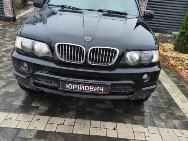 Черный БМВ Х5, объемом двигателя 3 л и пробегом 400 тыс. км за 7400 $, фото 1 на Automoto.ua