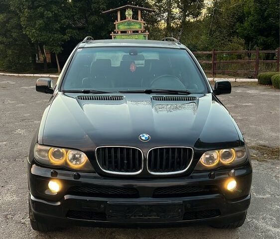 Чорний БМВ Х5, об'ємом двигуна 3 л та пробігом 400 тис. км за 6000 $, фото 1 на Automoto.ua