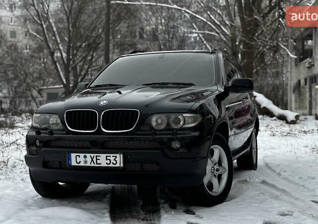 Черный БМВ Х5, объемом двигателя 3 л и пробегом 250 тыс. км за 6900 $, фото 1 на Automoto.ua