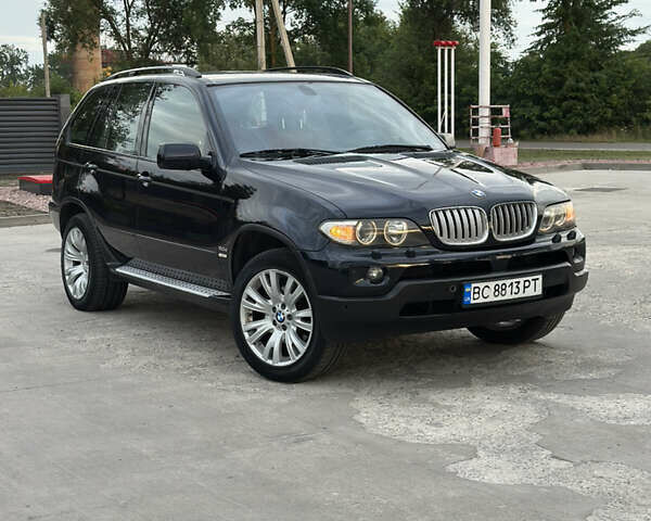 Чорний БМВ Х5, об'ємом двигуна 3 л та пробігом 457 тис. км за 12000 $, фото 1 на Automoto.ua