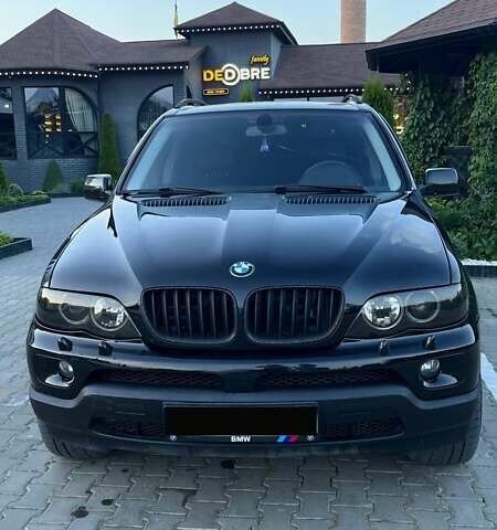 Черный БМВ Х5, объемом двигателя 3 л и пробегом 330 тыс. км за 12000 $, фото 1 на Automoto.ua