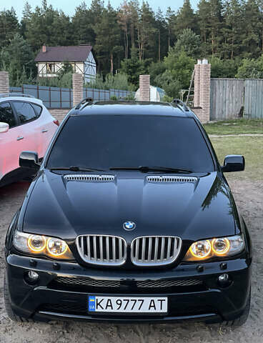 Чорний БМВ Х5, об'ємом двигуна 4.4 л та пробігом 165 тис. км за 12000 $, фото 1 на Automoto.ua