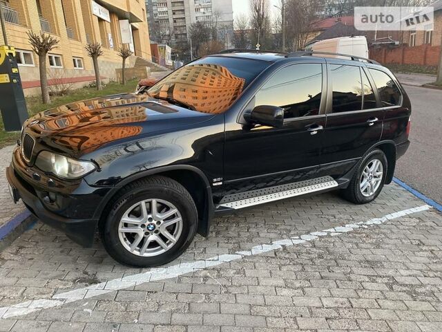 Чорний БМВ Х5, об'ємом двигуна 3 л та пробігом 297 тис. км за 12400 $, фото 1 на Automoto.ua