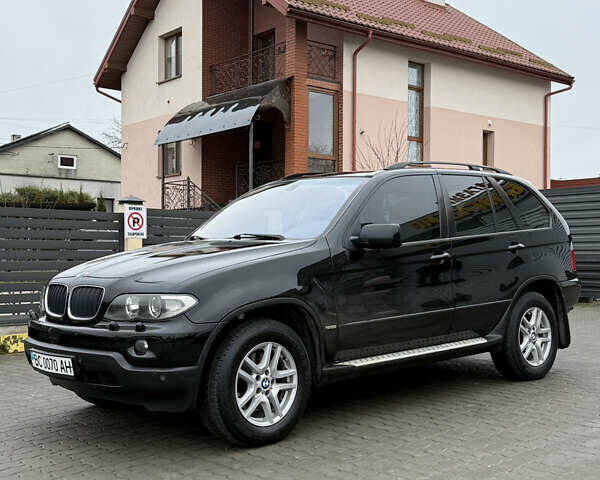 Черный БМВ Х5, объемом двигателя 3 л и пробегом 370 тыс. км за 10900 $, фото 1 на Automoto.ua