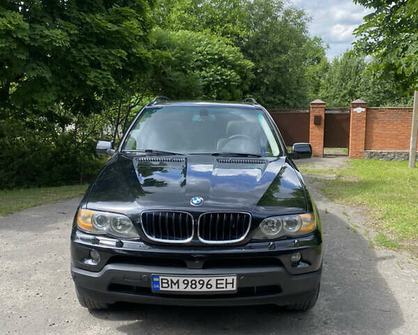 Черный БМВ Х5, объемом двигателя 3 л и пробегом 318 тыс. км за 11900 $, фото 1 на Automoto.ua