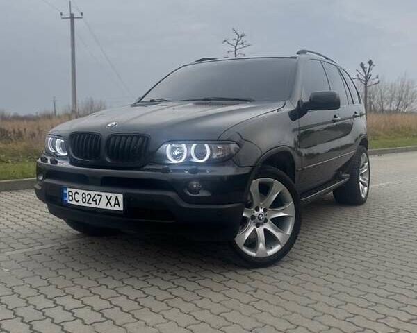 Чорний БМВ Х5, об'ємом двигуна 2.99 л та пробігом 297 тис. км за 12999 $, фото 1 на Automoto.ua