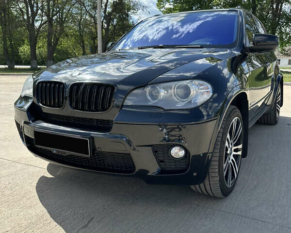 Черный БМВ Х5, объемом двигателя 3 л и пробегом 240 тыс. км за 24999 $, фото 1 на Automoto.ua