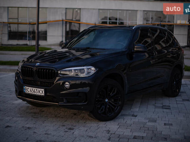 Черный БМВ Х5, объемом двигателя 3 л и пробегом 235 тыс. км за 28500 $, фото 1 на Automoto.ua