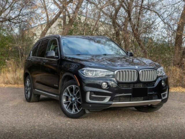 Чорний БМВ Х5, об'ємом двигуна 3 л та пробігом 84 тис. км за 14300 $, фото 1 на Automoto.ua