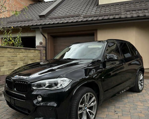 Черный БМВ Х5, объемом двигателя 3 л и пробегом 187 тыс. км за 28560 $, фото 1 на Automoto.ua