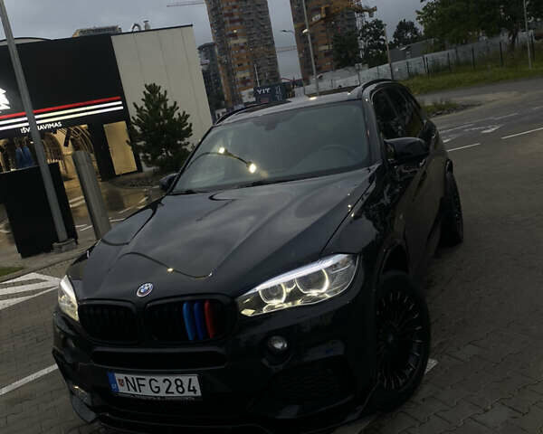 Черный БМВ Х5, объемом двигателя 2 л и пробегом 330 тыс. км за 31500 $, фото 1 на Automoto.ua