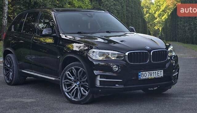 Чорний БМВ Х5, об'ємом двигуна 2 л та пробігом 198 тис. км за 23000 $, фото 1 на Automoto.ua