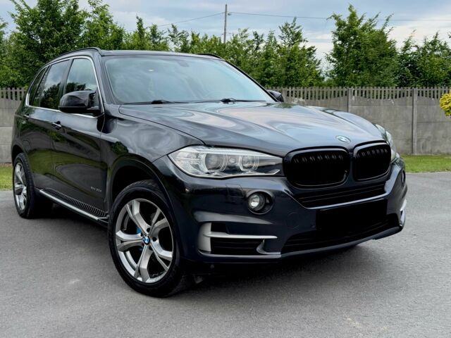 Чорний БМВ Х5, об'ємом двигуна 3 л та пробігом 130 тис. км за 12000 $, фото 1 на Automoto.ua