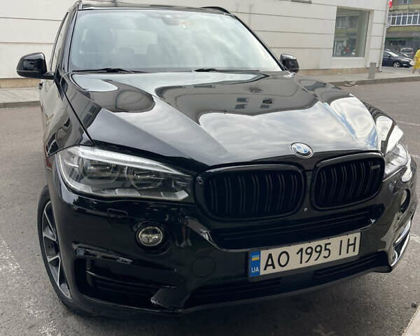 Черный БМВ Х5, объемом двигателя 2 л и пробегом 204 тыс. км за 26900 $, фото 1 на Automoto.ua
