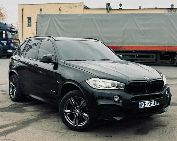 Черный БМВ Х5, объемом двигателя 3 л и пробегом 224 тыс. км за 31000 $, фото 1 на Automoto.ua