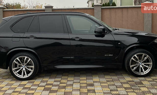 Черный БМВ Х5, объемом двигателя 3 л и пробегом 180 тыс. км за 32000 $, фото 1 на Automoto.ua