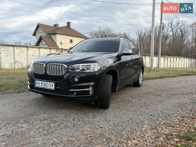 Черный БМВ Х5, объемом двигателя 2 л и пробегом 132 тыс. км за 24900 $, фото 1 на Automoto.ua